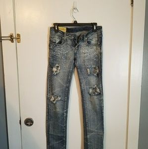 Light washed ripped jeans with adorable gems